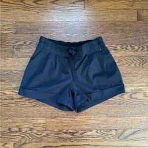 Lululemon black pleated short with tie. Size 4.EUC